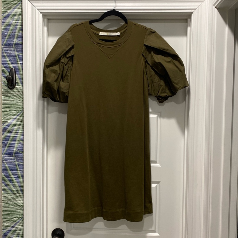 Mid thigh thick cotton  and kinda terrycloth on inside.  puff sleeve